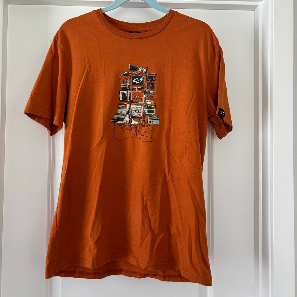 Oakley “Art of Oakley” Orange T-Shirt Graphic Artist Print Medium